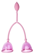 Вакуумный массажёр для груди розового цвета - фото, цены