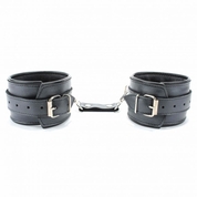 Черные кожаные наручники с металлическими клепками - фото, цены