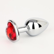 Серебристая анальная пробка с красным кристаллом в форме сердца - 7 см. - фото, цены
