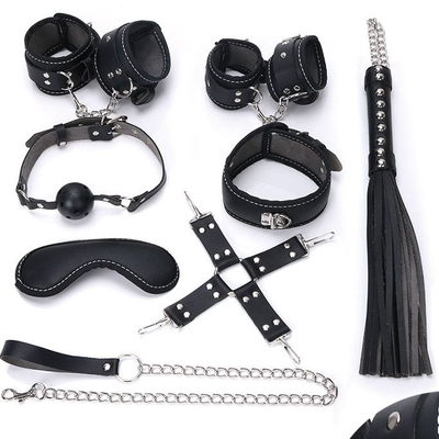 Пикантный черный набор бдсм: маска, ошейник, кляп, фиксатор, наручники, оковы, плеть - фото, цены