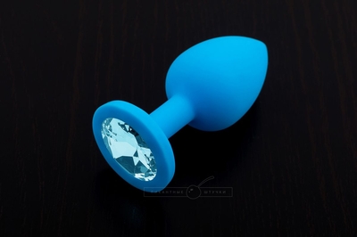 Маленькая голубая силиконовая пробка с голубым кристаллом - 7,5 см. - фото, цены