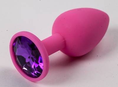 Розовая силиконовая анальная пробка с фиолетовым стразом - 7,1 см. - фото, цены