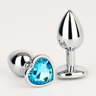 Серебристая анальная пробка с голубым кристаллом в форме сердца - 7 см. - фото, цены