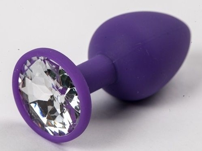 Фиолетовая силиконовая анальная пробка с прозрачным стразом - 7,1 см. - фото, цены
