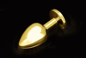 Большая золотая анальная пробка с закругленным кончиком и сиреневым кристаллом - 9 см. - фото, цены
