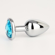 Серебристая анальная пробка с голубым кристаллом в форме сердца - 7 см. - фото, цены