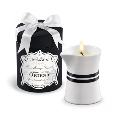 Массажное масло в виде большой свечи Petits Joujoux Orient с ароматом граната и белого перца - фото, цены