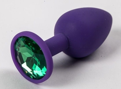 Фиолетовая силиконовая анальная пробка с зеленым стразом - 7,1 см. - фото, цены