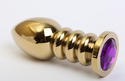 Золотистая фигурная анальная пробка с фиолетовым стразом - 10,3 см. - фото, цены