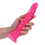 Розовый люминесцентный фаллоимитатор на присоске - 25 см.