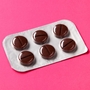 Шоколадные таблетки в коробке Альфачкапс - 24 гр.